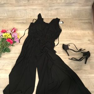 Black jump Suit Size L